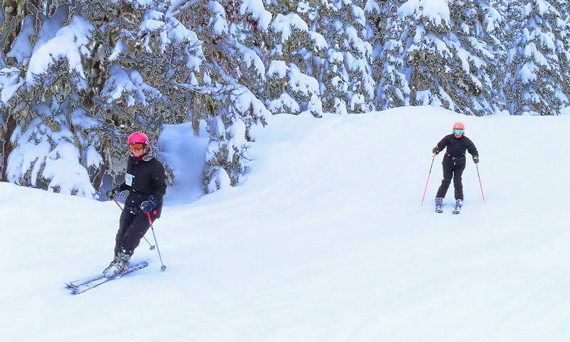 A couple skiing