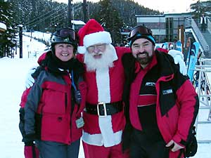 Sheridan and Emilio with Santa Claus at Steven Pass, WA.